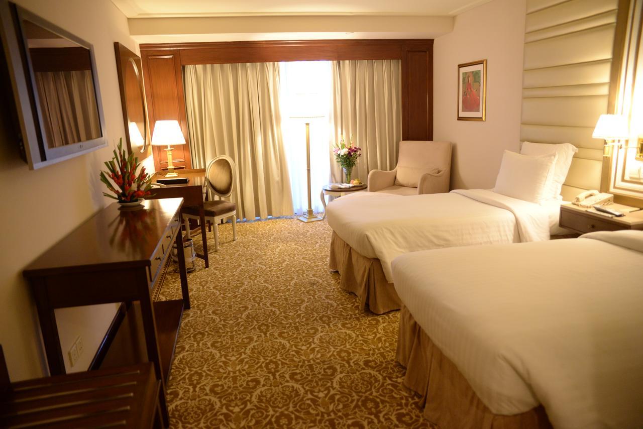Pearl Continental Hotel, Karachi Exteriör bild A room at the hotel